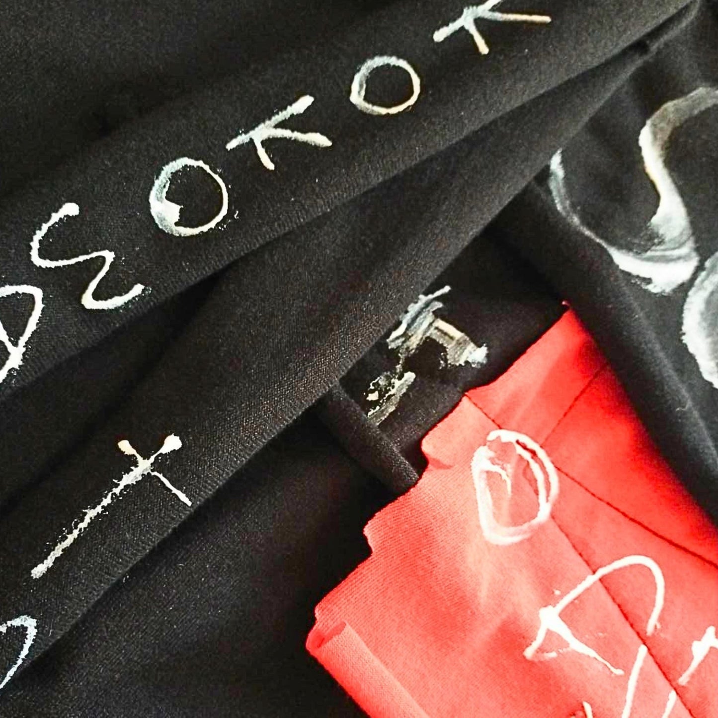 Face No.002 | Romaji writing – Oversized Black Sleeveless Top